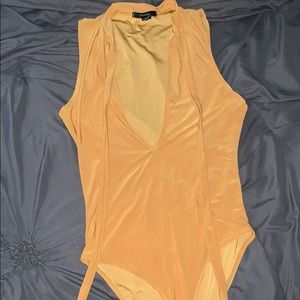 yellow bodysuit